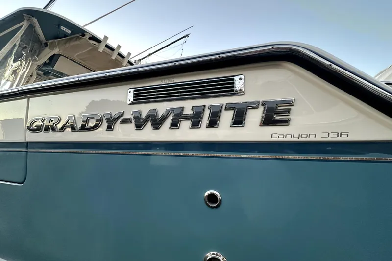 Killer B Yacht Photos Pics 2019 Grady-White Canyon 336 boat, close-up of logo and model name.