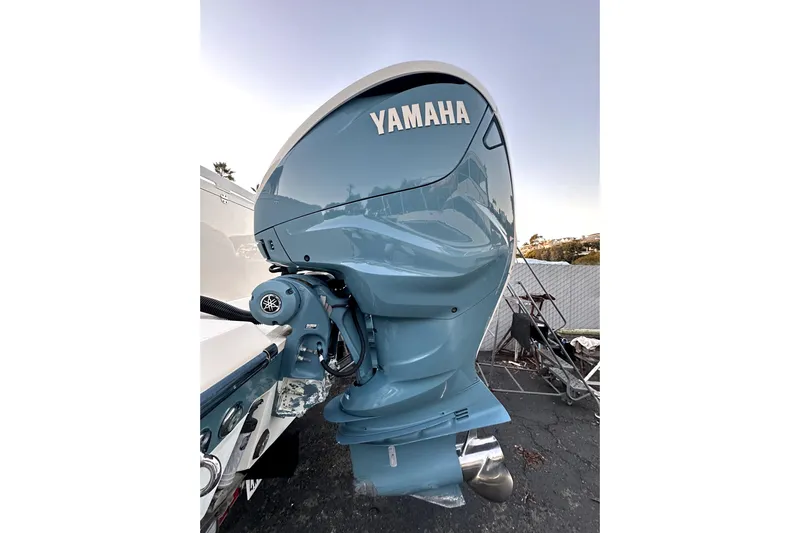 Killer B Yacht Photos Pics 2019 Grady-White Canyon 336 with Yamaha outboard motor, side view.