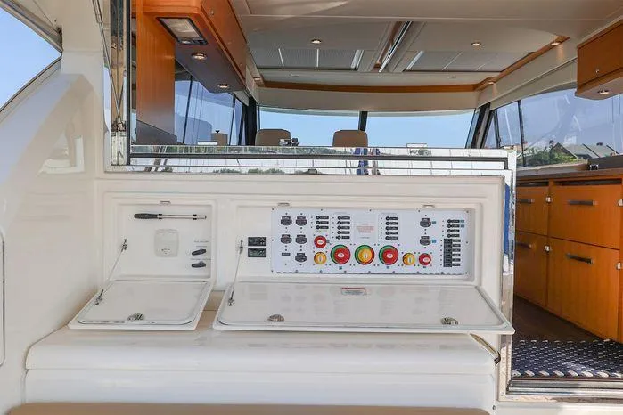 Eagle Yacht Photos Pics Control panel on a 2016 Riviera 525 SUV yacht interior.