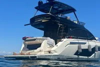 2023 Cranchi E52F yacht on water, showcasing sleek design and luxury features.