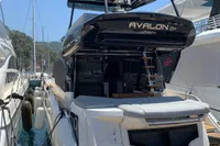 2023 Cranchi E52F yacht docked at marina, rear view.