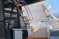 2023 Cranchi E52F yacht interior with sleek staircase and modern design.