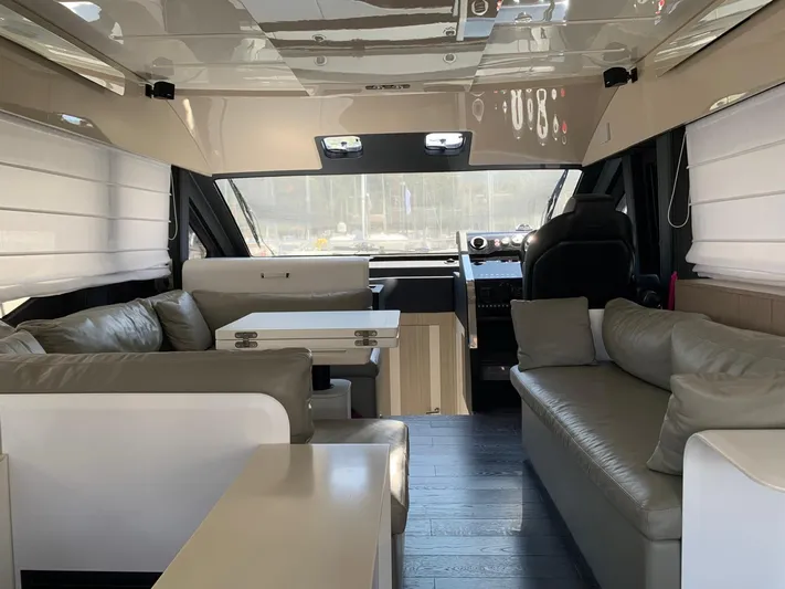  Yacht Photos Pics Luxurious interior of 2023 Cranchi E52F yacht with modern seating and sleek design.