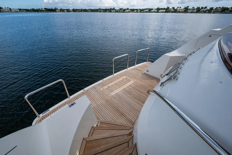 Lila Cuy Yacht Photos Pics Luxury yacht deck of 2006 Westport w112 overlooking serene water.