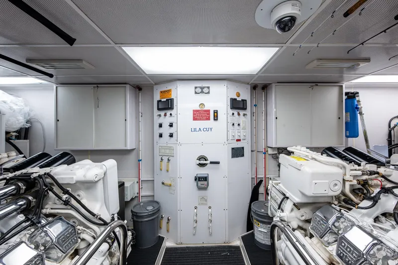 Lila Cuy Yacht Photos Pics Engine room of 2006 Westport w112 yacht with control panels and machinery.