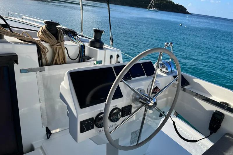 Family Therapy Yacht Photos Pics Helm of 2023 Fountaine Pajot Elba 45 Catamaran with ocean view.