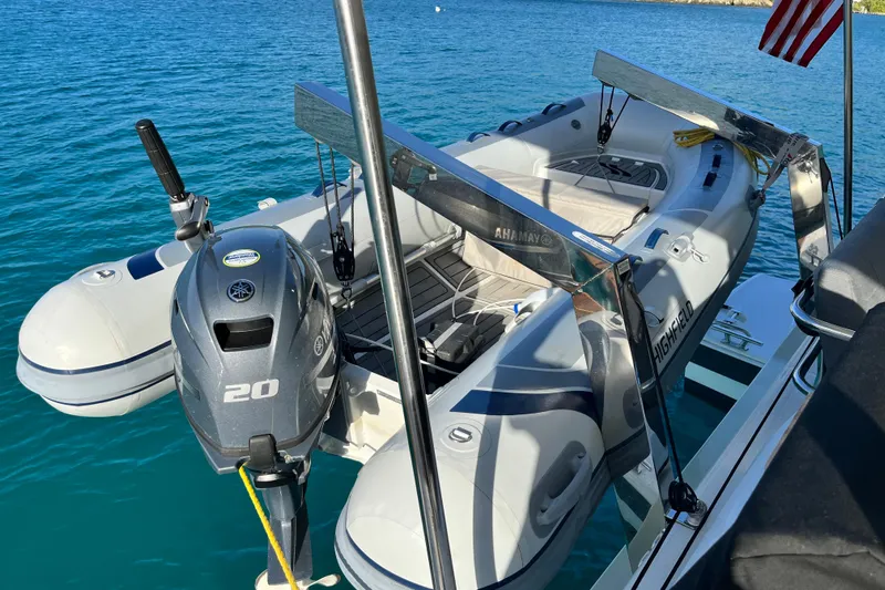 Family Therapy Yacht Photos Pics 2023 Fountaine Pajot Elba 45 Catamaran with Highfield dinghy and Yamaha outboard motor.