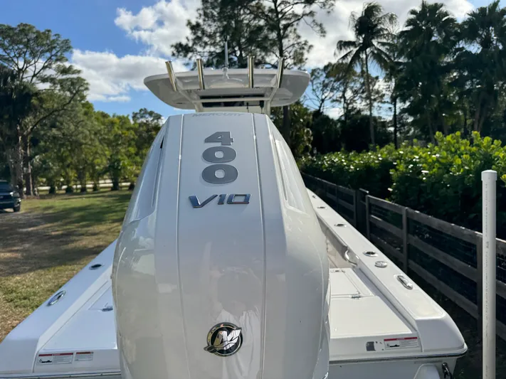  Yacht Photos Pics 2024 Everglades 253 Center Console boat with 400 V10 engine, outdoors.