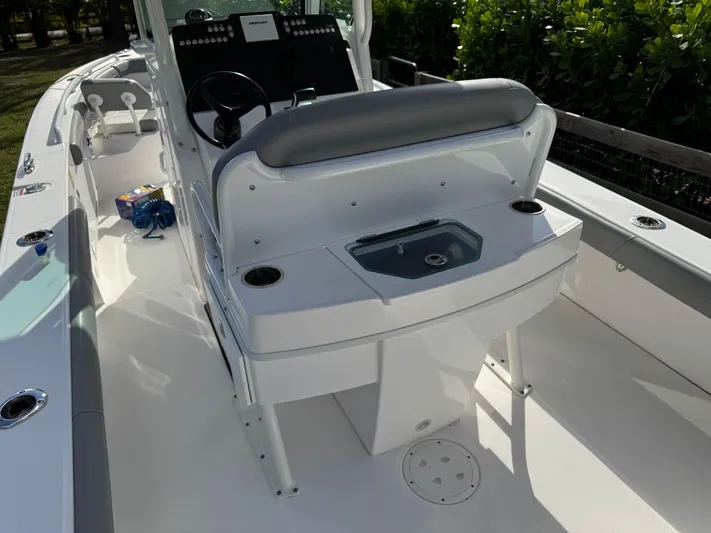  Yacht Photos Pics 2024 Everglades 253 Center Console boat interior with seating and console.