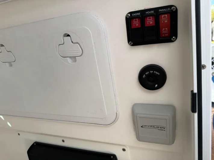  Yacht Photos Pics 2024 Everglades 253 Center Console control panel with switches and gauges.