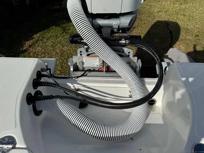  Yacht Photos Pics 2024 Everglades 253 Center Console boat engine and hose connections.