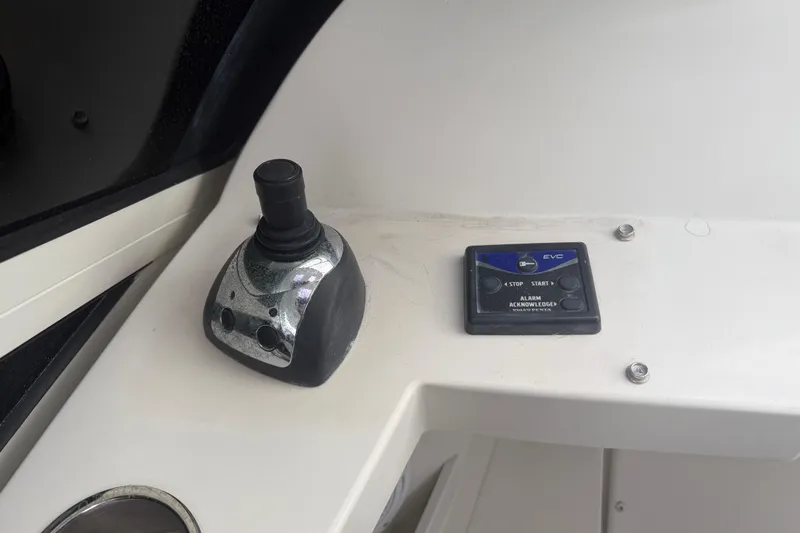  Yacht Photos Pics Control panel of a 2009 Carver 44 Sojourn boat with joystick and EVC system.