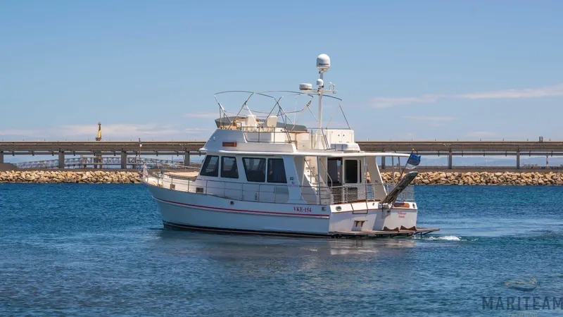 American Dream Yacht Photos Pics 2011 Grand Banks 41 Heritage EU yacht cruising on calm blue waters.