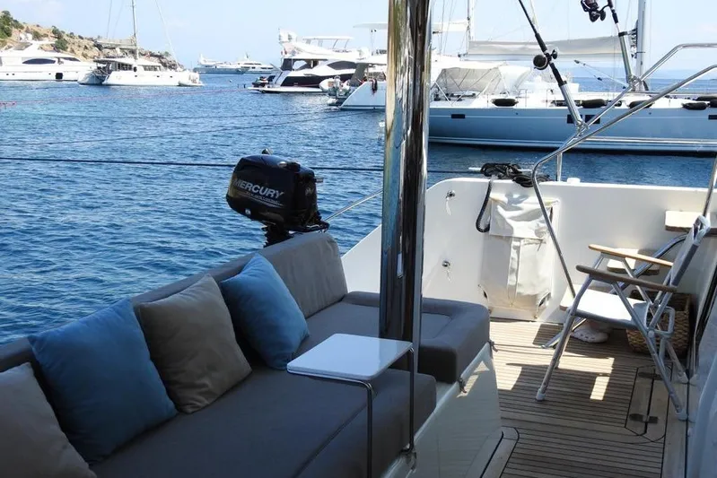  Yacht Photos Pics Luxurious 2014 Lagoon 560 S2 yacht interior with ocean view and comfortable seating.
