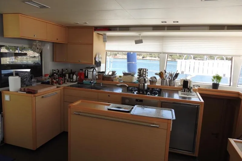  Yacht Photos Pics Modern kitchen interior on 2014 Lagoon 560 S2 yacht with ocean view.
