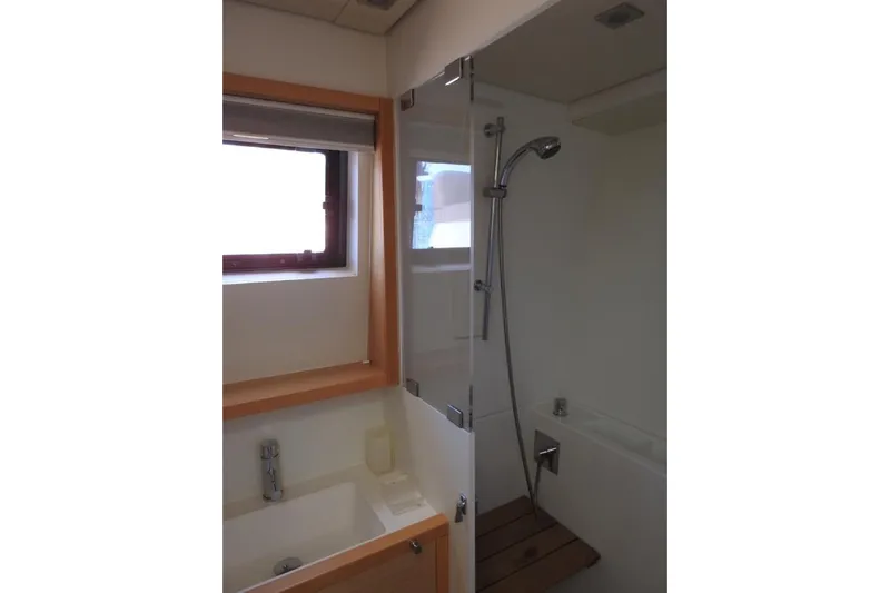  Yacht Photos Pics Bathroom interior of 2014 Lagoon 560 S2 yacht with shower and sink.
