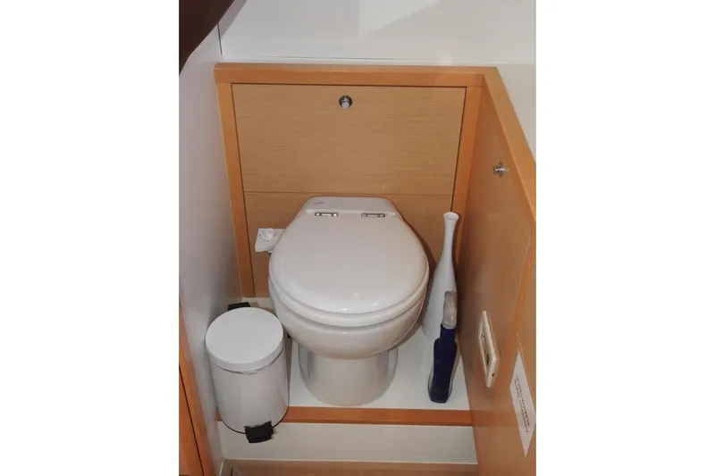  Yacht Photos Pics Toilet area in 2014 Lagoon 560 S2 yacht, featuring modern design and compact layout.