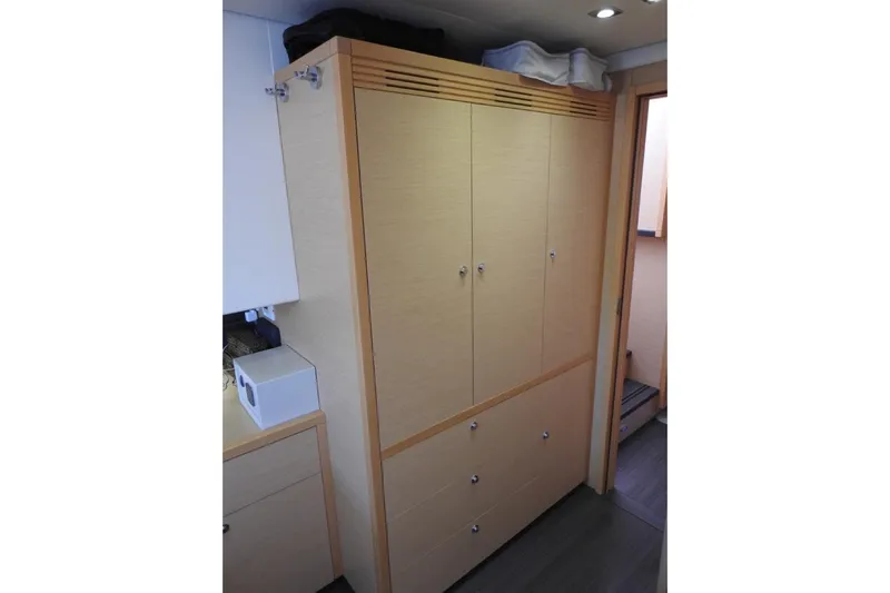  Yacht Photos Pics Interior of 2014 Lagoon 560 S2 yacht with wooden cabinetry and modern design.
