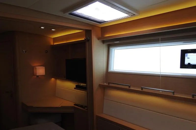  Yacht Photos Pics Luxurious interior of 2014 Lagoon 560 S2 yacht with modern lighting and sleek design.