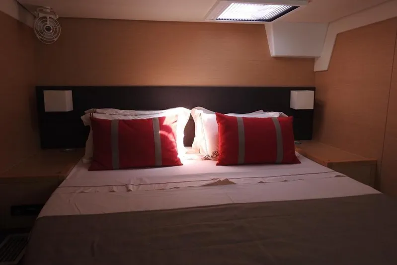  Yacht Photos Pics Luxurious cabin interior of 2014 Lagoon 560 S2 yacht with cozy bedding.