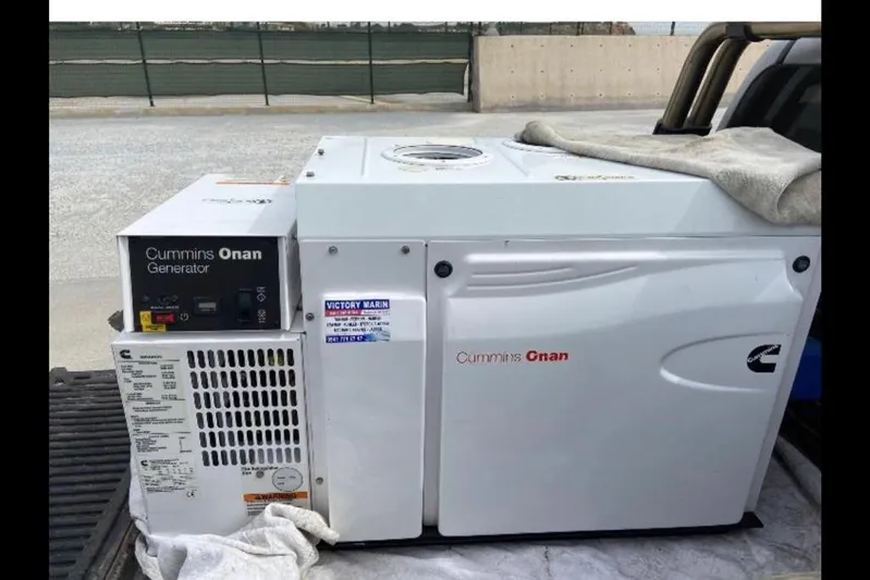  Yacht Photos Pics Cummins Onan generator on a Lagoon 560 S2, 2014 model, displayed outdoors.