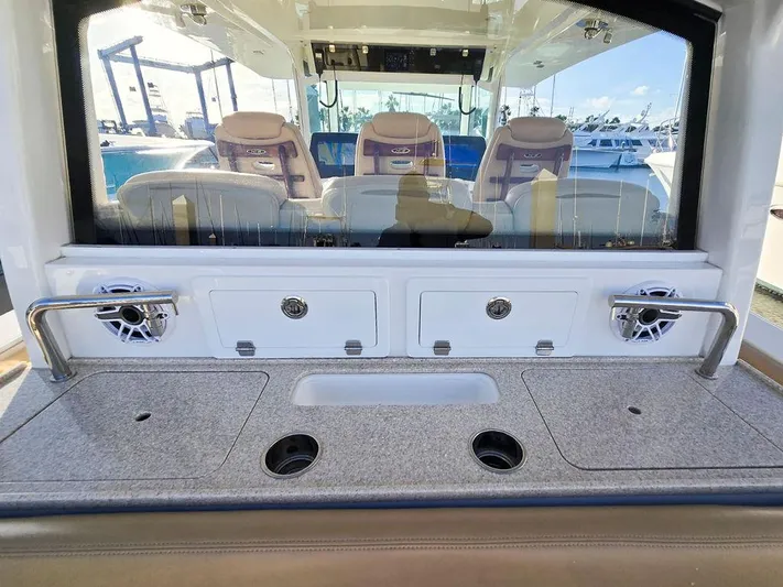 Hcb Yacht Photos Pics 2023 HCB Suenos boat interior with seating and storage compartments.