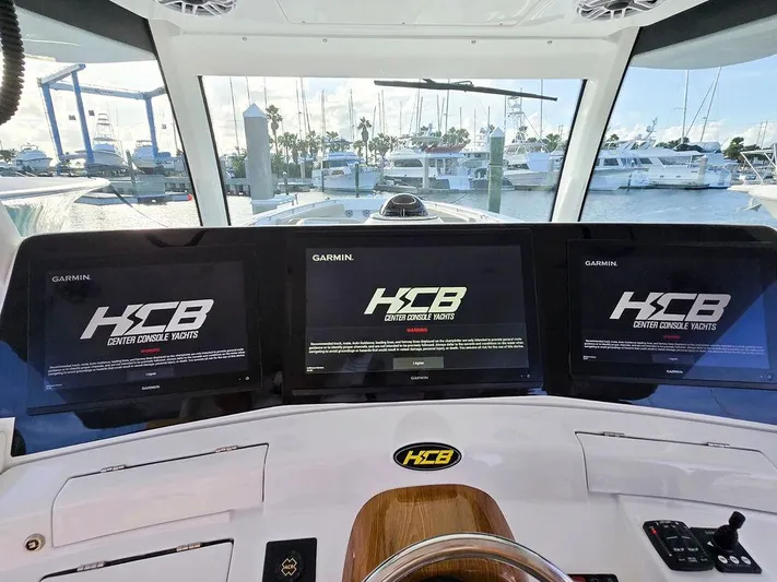Hcb Yacht Photos Pics 2023 HCB Suenos boat dashboard with Garmin displays at marina.