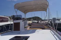 2023 Gozzo Positano 27 Open boat with canopy, docked in a marina.