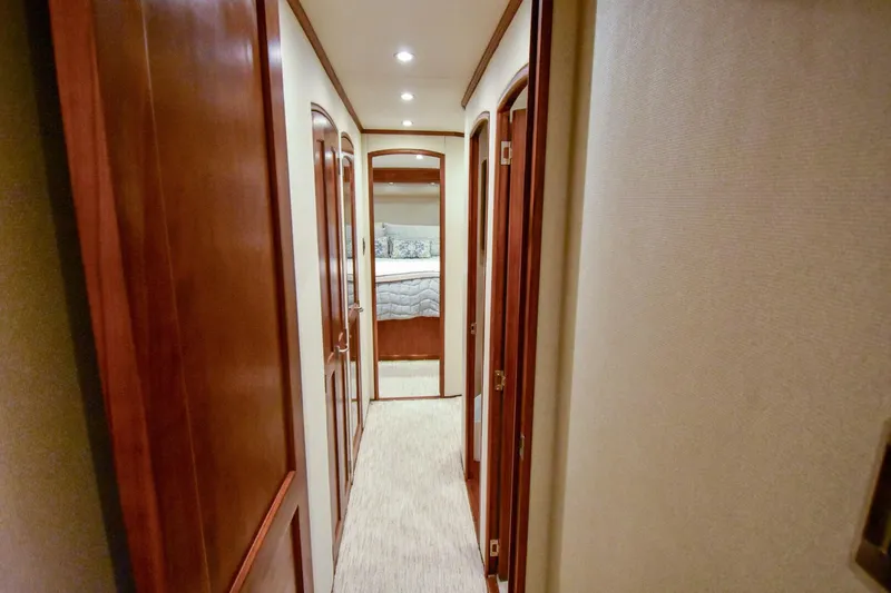 Emma Ruth Yacht Photos Pics Luxurious hallway inside 1991 Monterey 65 Convertible Custom Sportfish yacht.