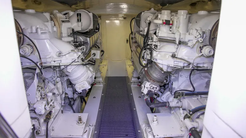 Emma Ruth Yacht Photos Pics Engine room of 1991 Monterey 65 Convertible Custom Sportfish with dual engines.