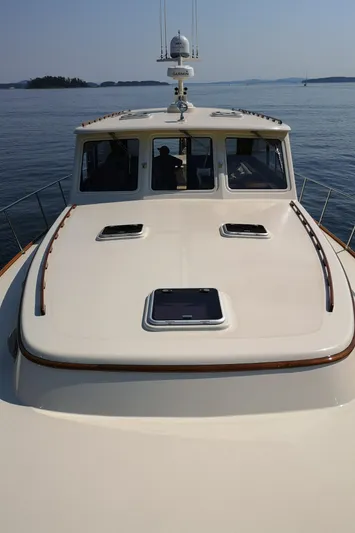 Ripplecove Yacht Photos Pics 2006 Vicem 54 Classic yacht on calm water, showcasing sleek deck design.