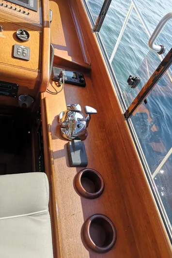 Ripplecove Yacht Photos Pics Interior view of 2006 Vicem 54 Classic yacht with wooden finish and control panel.