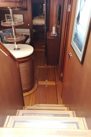 Ripplecove Yacht Photos Pics Interior of 2006 Vicem 54 Classic yacht with wooden flooring and elegant furnishings.