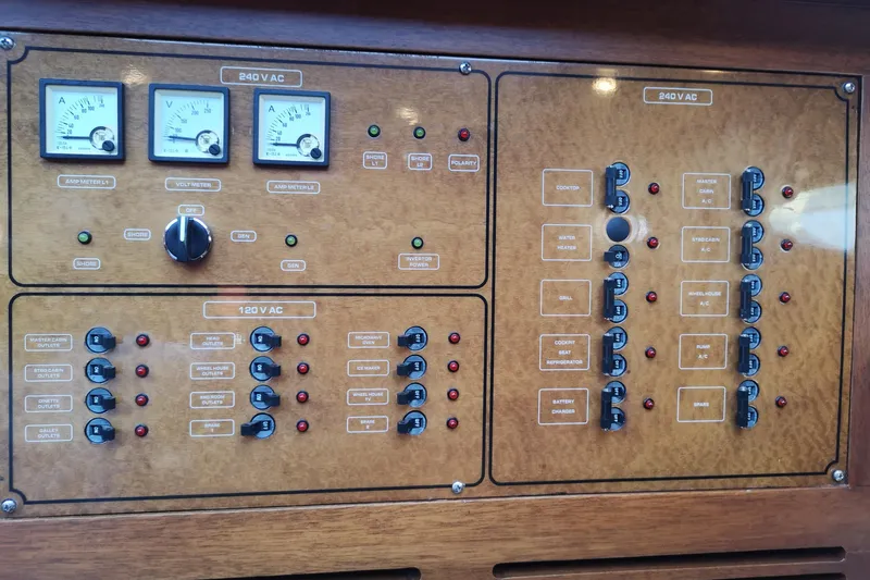 Ripplecove Yacht Photos Pics Electrical control panel on 2006 Vicem 54 Classic yacht, featuring gauges and switches.
