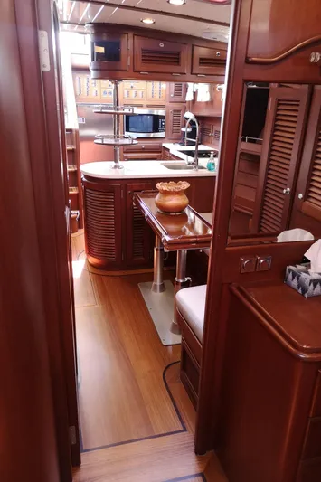 Ripplecove Yacht Photos Pics Luxurious interior of 2006 Vicem 54 Classic yacht with elegant wood finishes.