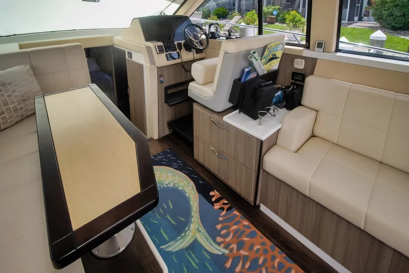  Yacht Photos Pics Luxurious interior of 2020 Regal 38 XO yacht with modern seating and decor.