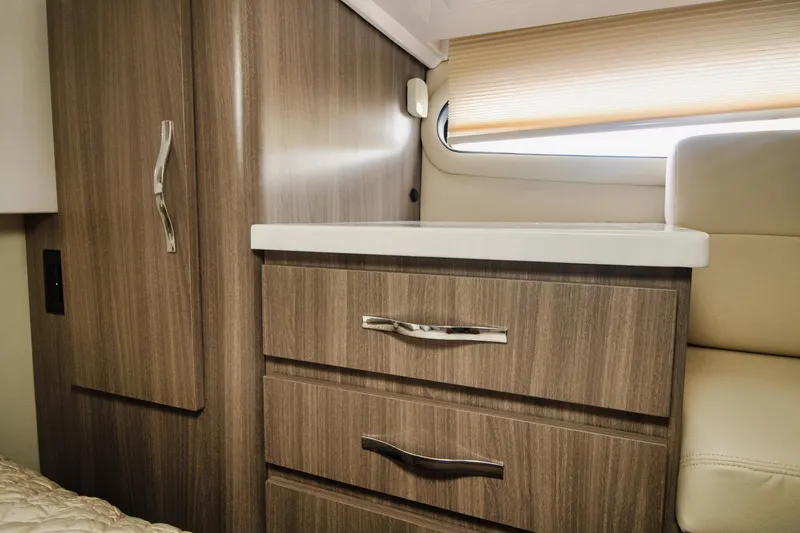  Yacht Photos Pics Interior of 2020 Regal 38 XO yacht with modern wood cabinetry and sleek design.