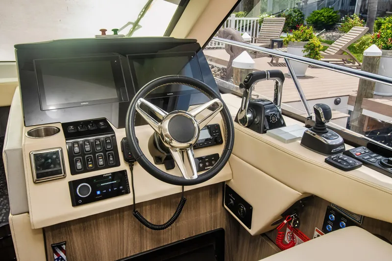  Yacht Photos Pics 2020 Regal 38 XO yacht helm with modern controls and steering wheel.