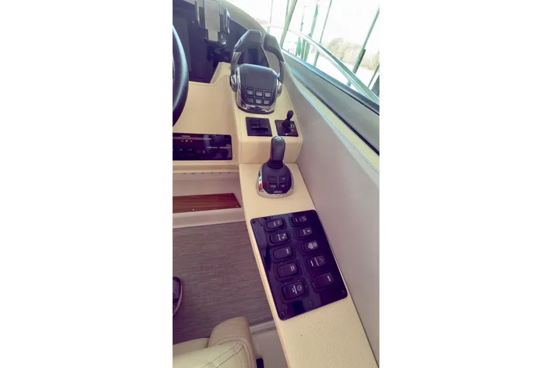  Yacht Photos Pics Control panel of 2020 Regal 33 Express boat with joystick and switches.