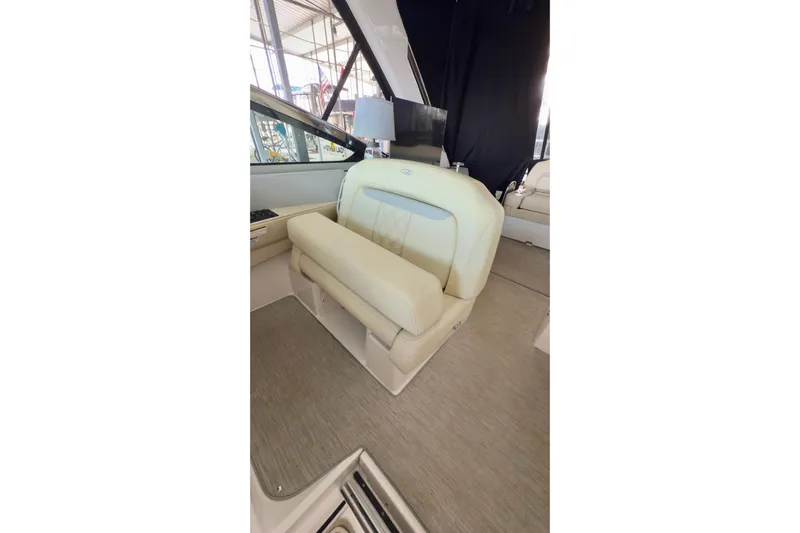  Yacht Photos Pics 2020 Regal 33 Express boat interior with beige seating and modern design.