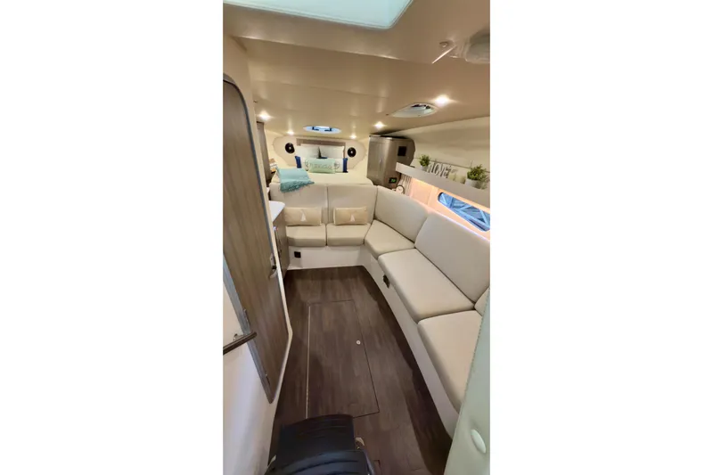  Yacht Photos Pics Luxurious interior of 2020 Regal 33 Express yacht with plush seating and modern decor.