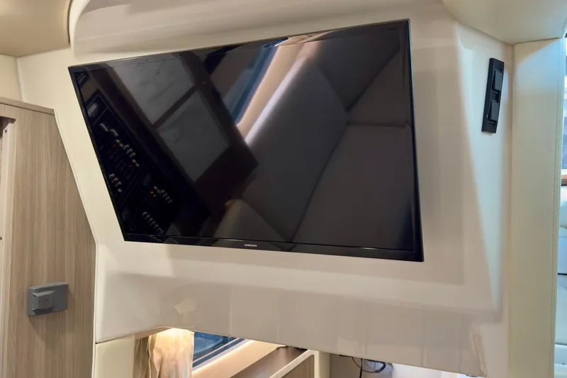 Yacht Photos Pics Flat-screen TV in 2020 Regal 33 Express boat interior.