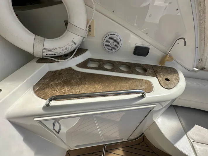 No Dploma Yacht Photos Pics 2009 Cruisers Yachts 420 Express interior with countertop, sink, and life preserver.