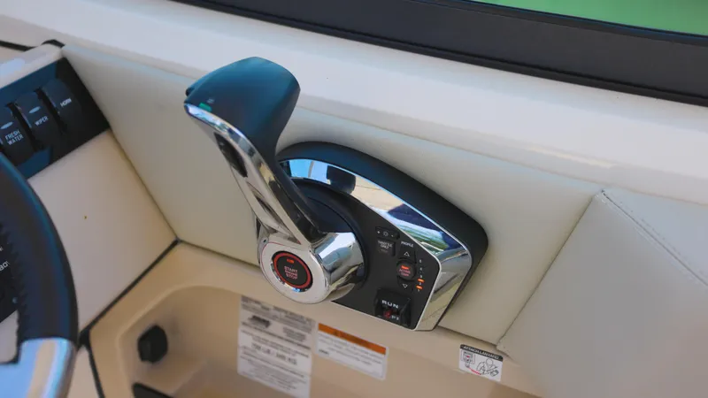  Yacht Photos Pics Throttle control of 2023 Boston Whaler 240 Vantage boat, featuring sleek design and modern controls.