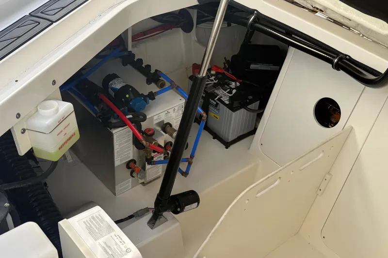  Yacht Photos Pics 2022 Sea Ray Sundancer 320 Outboard engine compartment with battery and wiring.