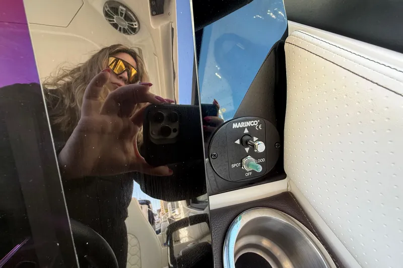  Yacht Photos Pics Reflection on Sea Ray Sundancer 320 Outboard 2022 interior with control panel and cup holder.