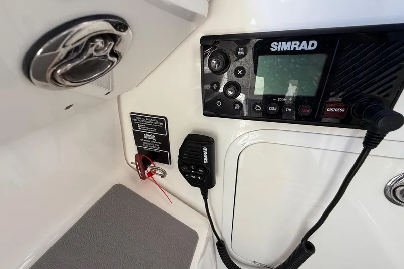  Yacht Photos Pics Control panel of 2022 Sea Ray Sundancer 320 Outboard with Simrad marine electronics.