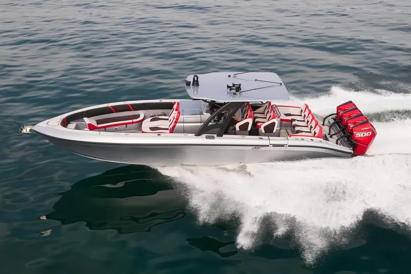  Yacht Photos Pics 2025 Midnight Express 37' Open boat cruising on water, featuring sleek design and powerful engines.