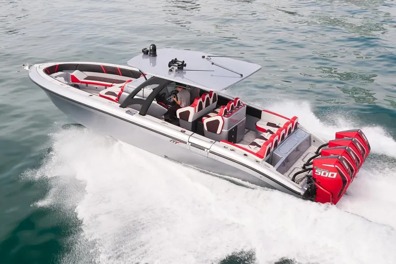  Yacht Photos Pics 2025 Midnight Express 37' Open boat cruising with powerful engines on the water.
