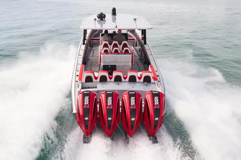  Yacht Photos Pics 2025 Midnight Express 37' Open boat with four powerful engines cruising on water.